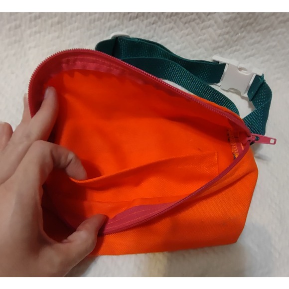 Bright orange fanny pack with green waist band - Picture 2 of 4